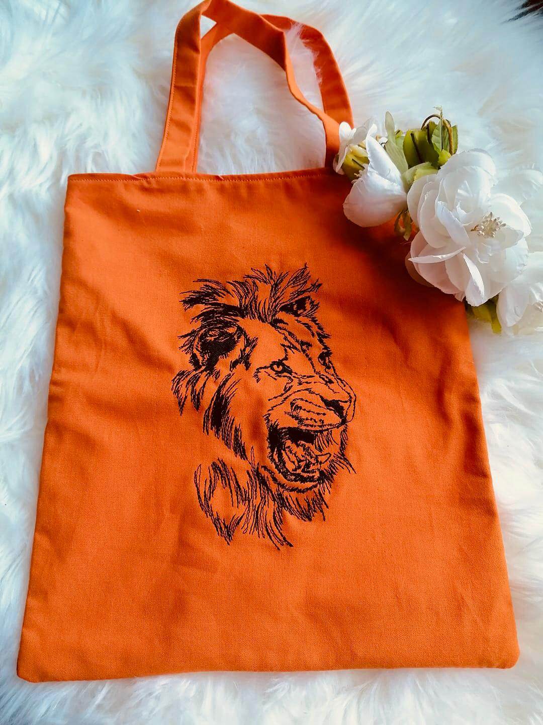 Löwe Stickdatei – Ausdrucksstarkes Löwenkopf-Motiv für kraftvolle Stickprojekte - Sewando