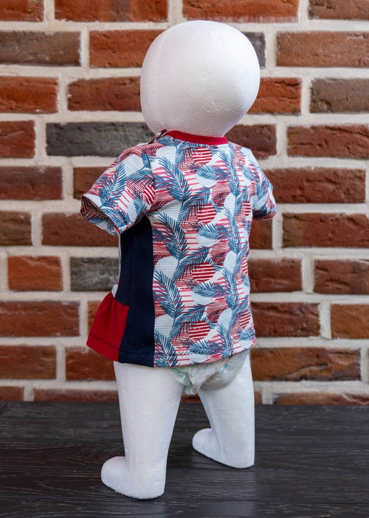 Schnittmuster Lia – Babyshirt mit Teilung & Knopfleiste aus Jersey Gr. 56-98 - Sewando