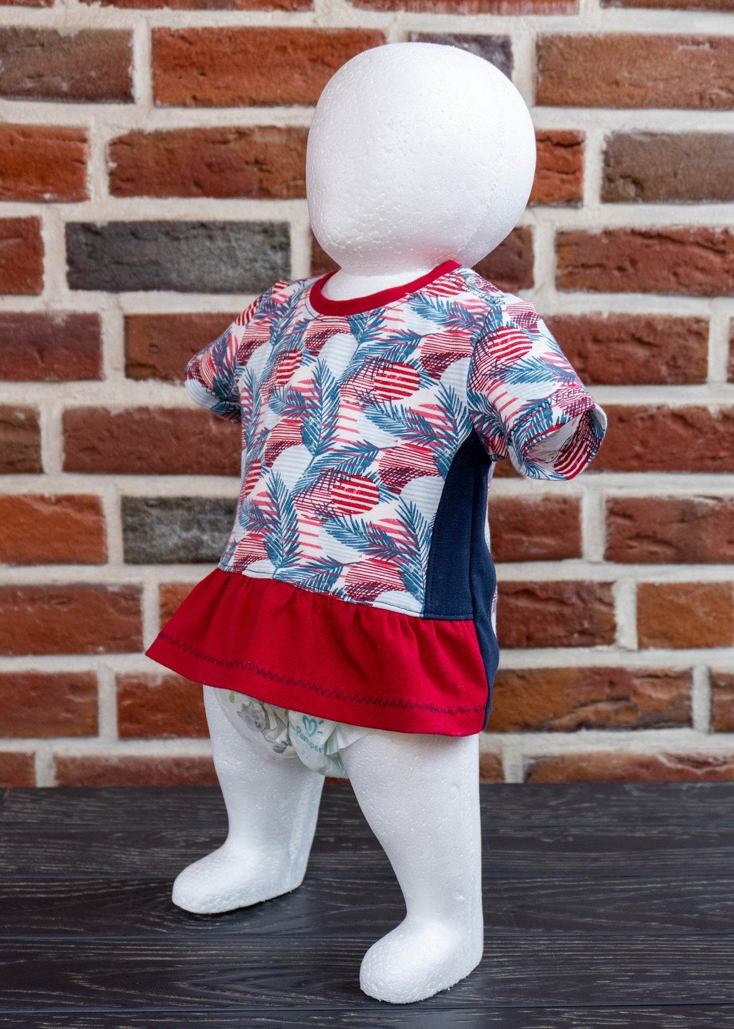 Schnittmuster Lia – Babyshirt mit Teilung & Knopfleiste aus Jersey Gr. 56-98 - Sewando