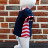 Schnittmuster Lia – Babyshirt mit Teilung & Knopfleiste aus Jersey Gr. 56-98 - Sewando