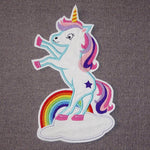 Stickdatei Einhorn stehend auf einer Wolke mit Regenbogen - Sewando