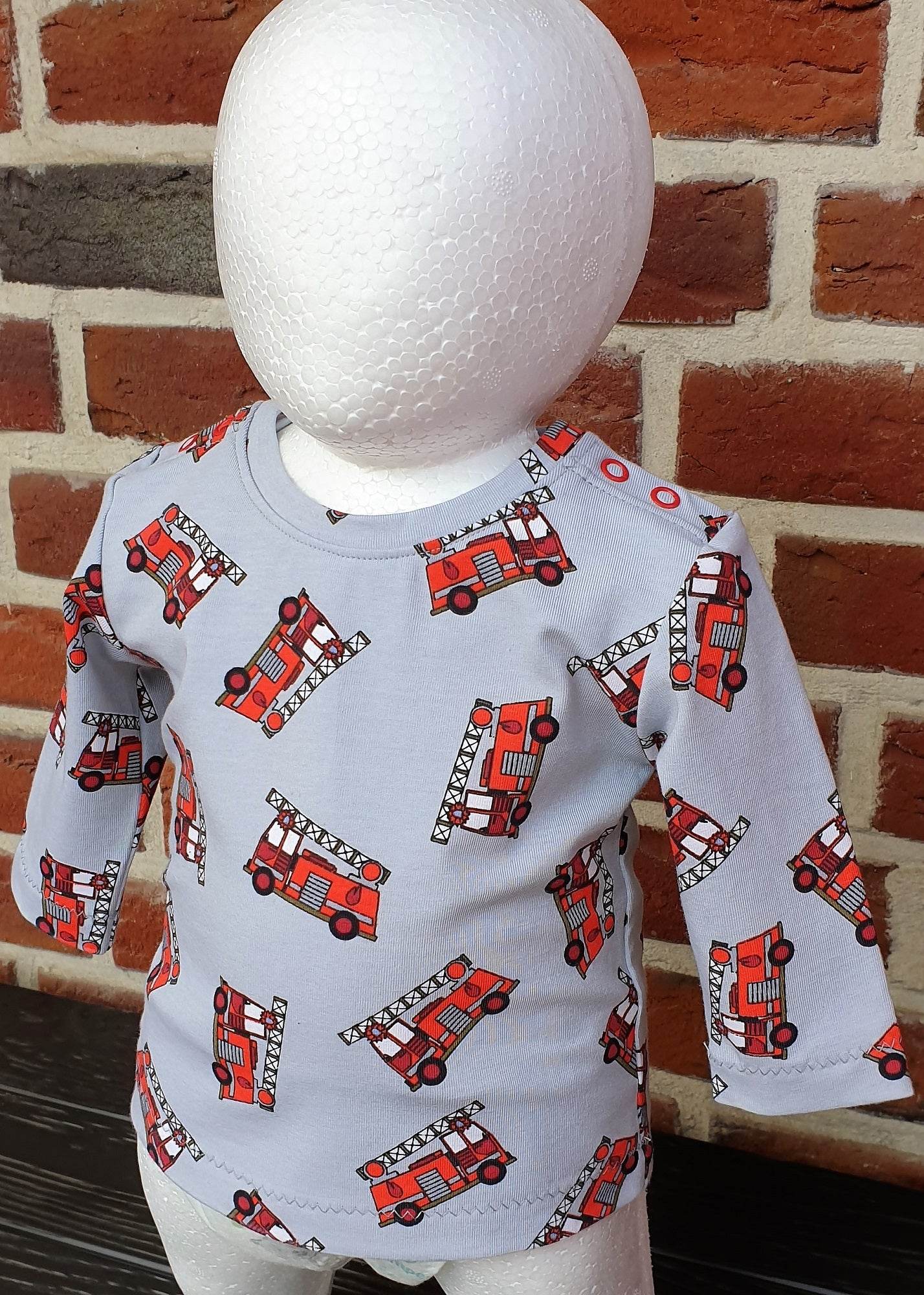 Schnittmuster Fin – Babyshirt mit Knopfleiste aus Jersey Gr. 44-98 - Sewando