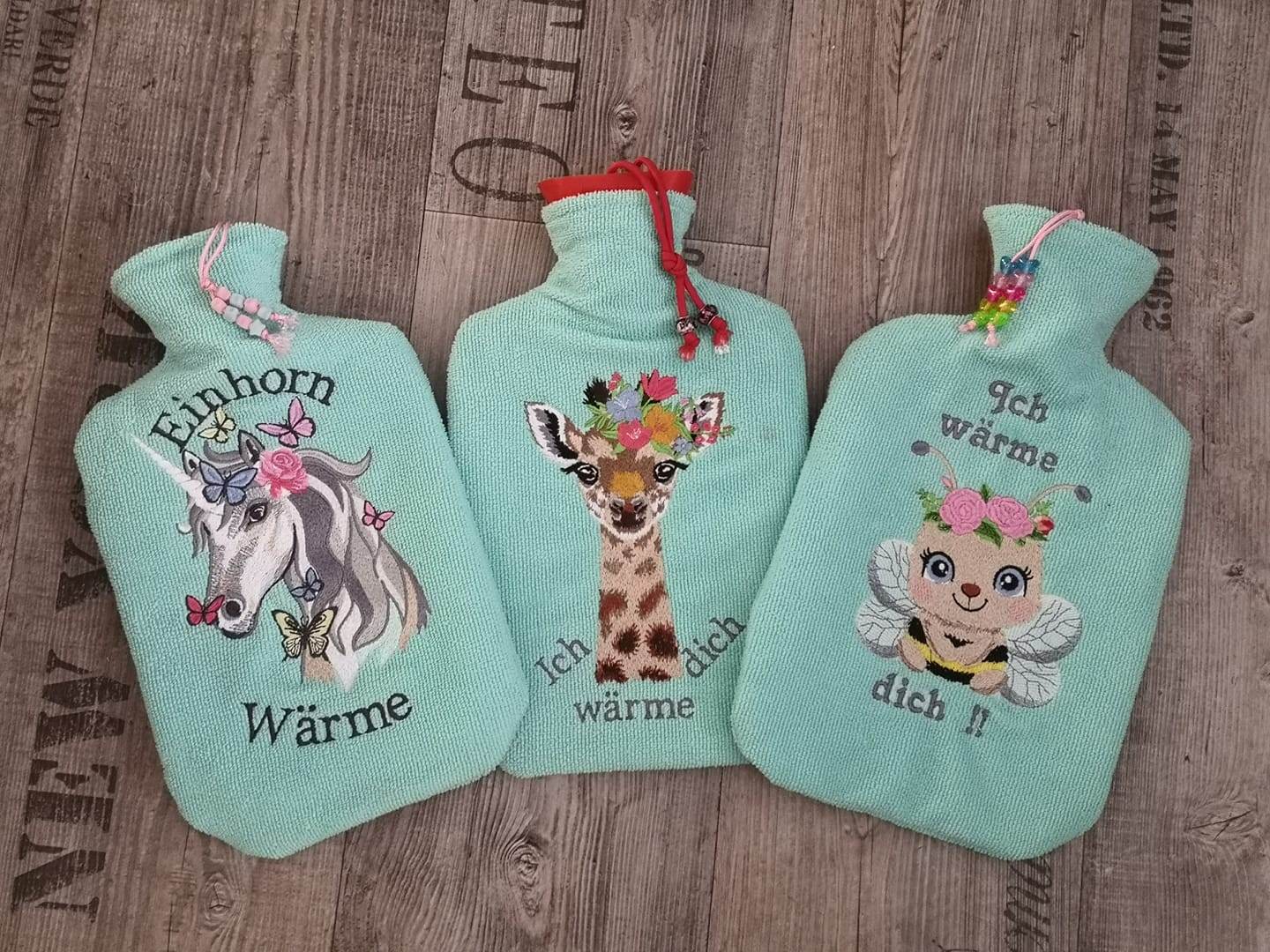 Giraffe Stickdatei, zierlicher Giraffenkopf mit Blumenkranz für deine Stickmaschine - Sewando