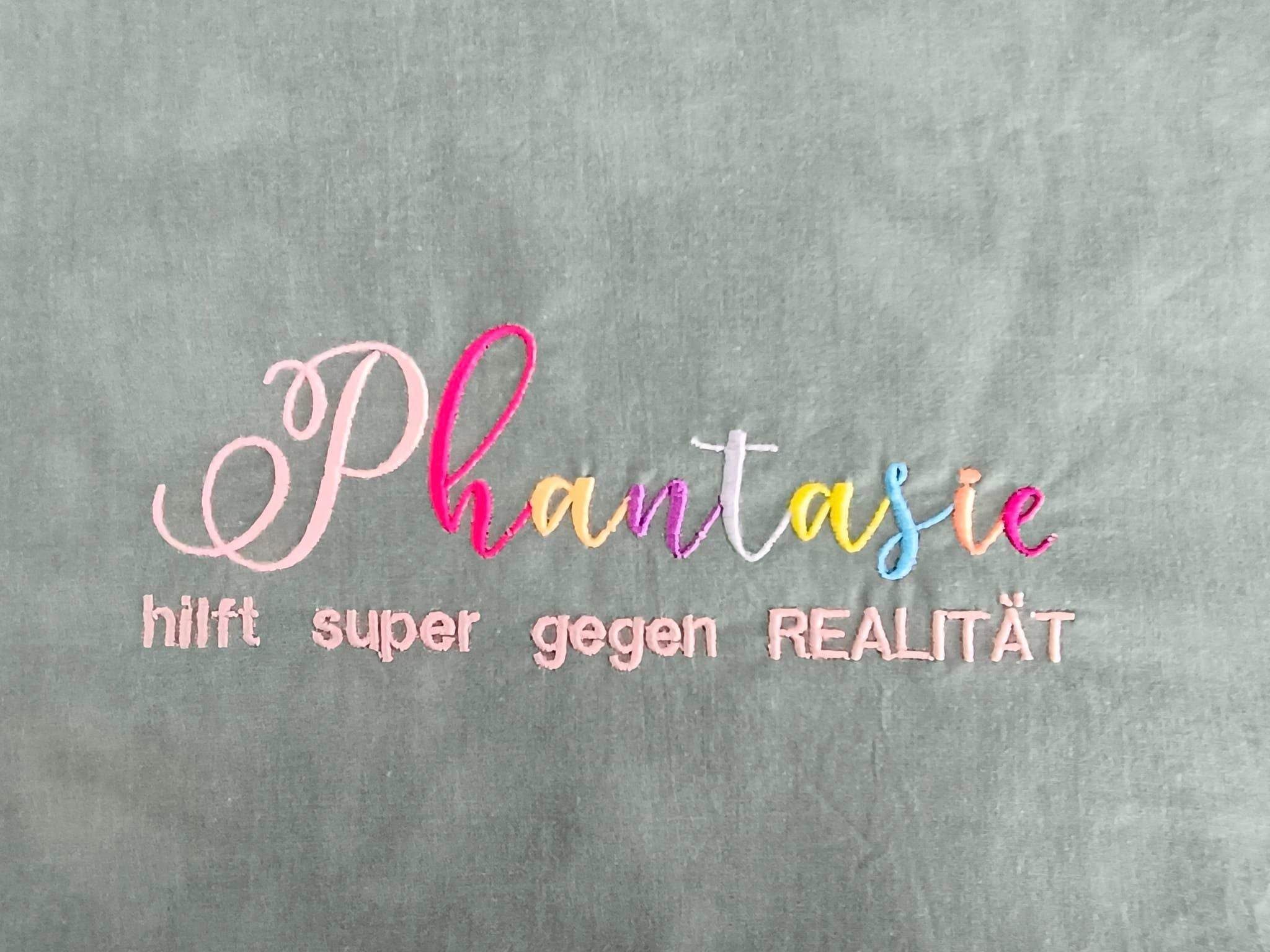 Stickdatei Spruch - Phantasie hilft super gegen Realität - Sewando
