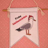 Stickdatei - Wimpel "Weihnachtsmöwe Frohe Weihnachten"