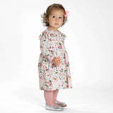 Schnittmuster Mädchenkleid ELLA – kleines Mädchen in Retro-Kleid mit Volants und floralen Mustern