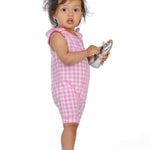 Schnittmuster Baby Overall MIA – Baby und Kleinkind Sommer-Jumpsuit in rosa mit Rüschenärmel.