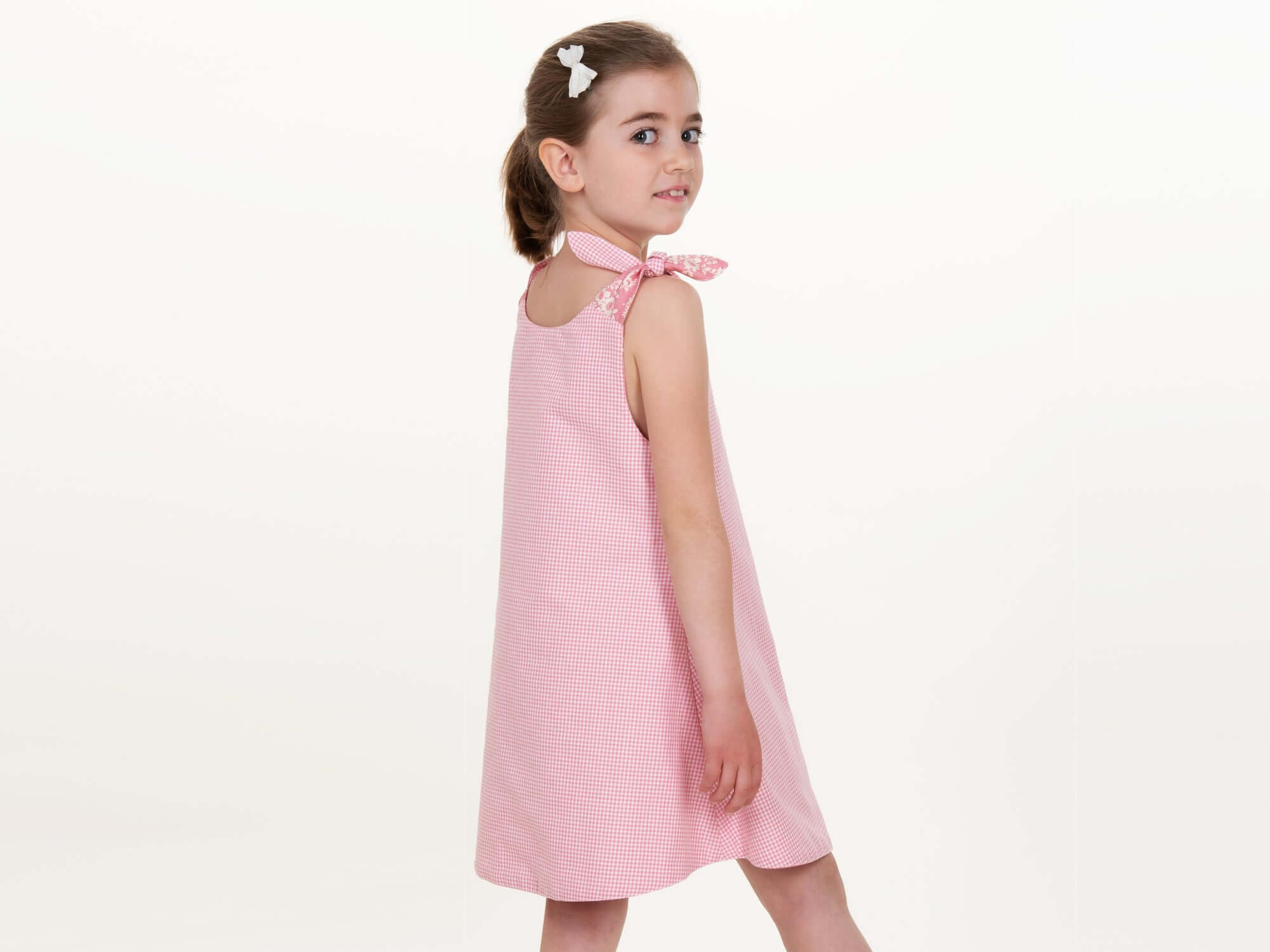 Schnittmuster Mädchenkleid STEFFI in rosa, Modell für Mädchen von Gr. 74 bis 152, ideal für den Sommer.