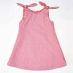 Schnittmuster Mädchenkleid STEFFI in rot kariert mit Schleifenknöpfen für Mädchen von Gr. 74 bis 152.