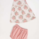 Schnittmuster Baby Twinset Babykleid Hängerchen und Pumphose, rosa Blumenmuster, ideal für Sommer und Winter.