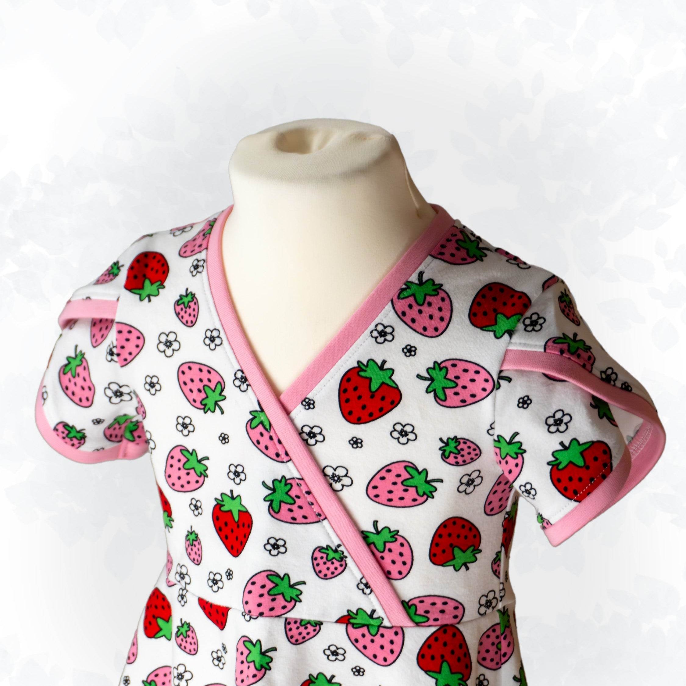 Schnittmuster Becca – Kinderkleid oder Shirt mit Wickeloptik aus Jersey Gr. 86-158 - Sewando
