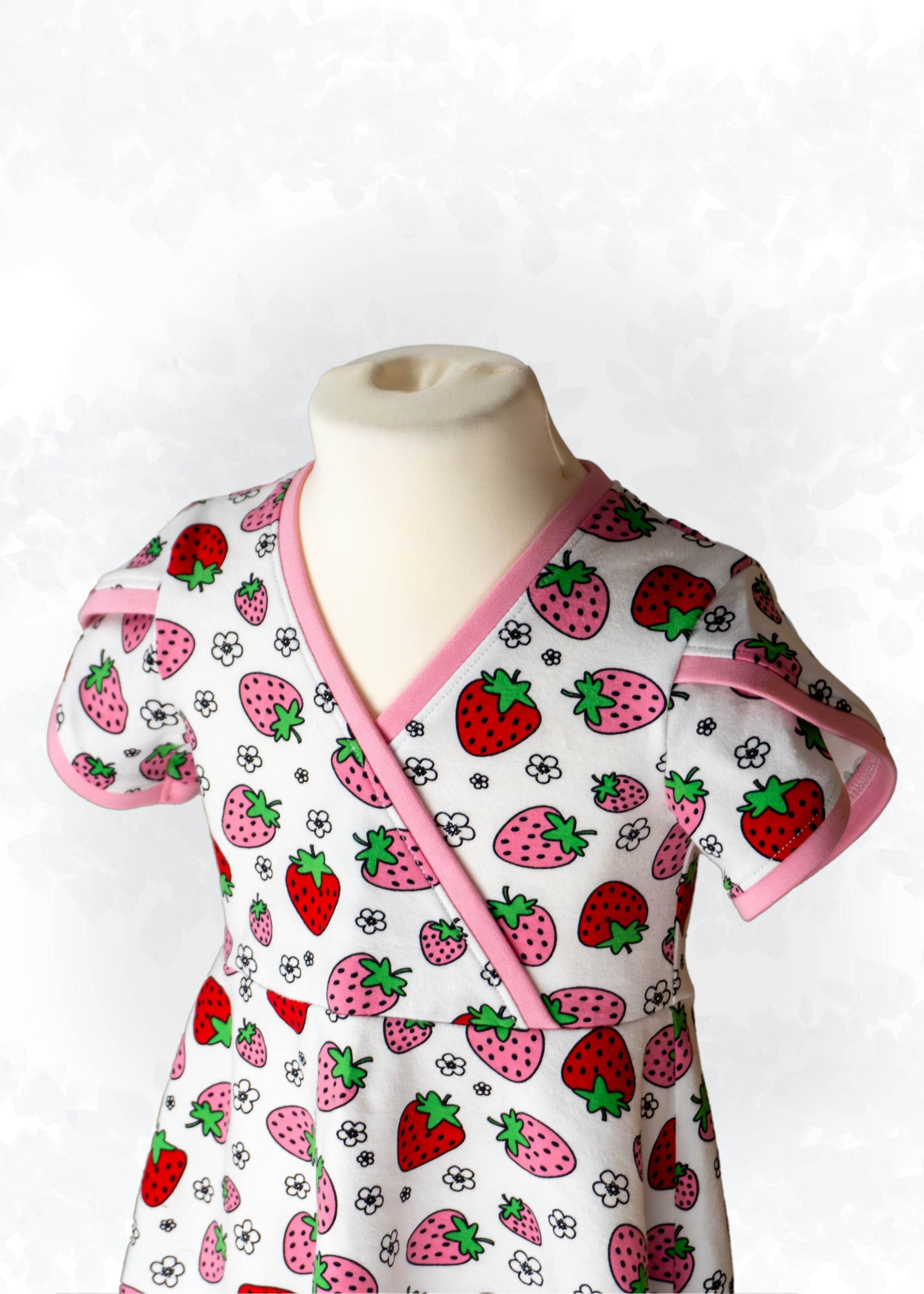 Schnittmuster Becca – Kinderkleid oder Shirt mit Wickeloptik aus Jersey Gr. 86-158 - Sewando