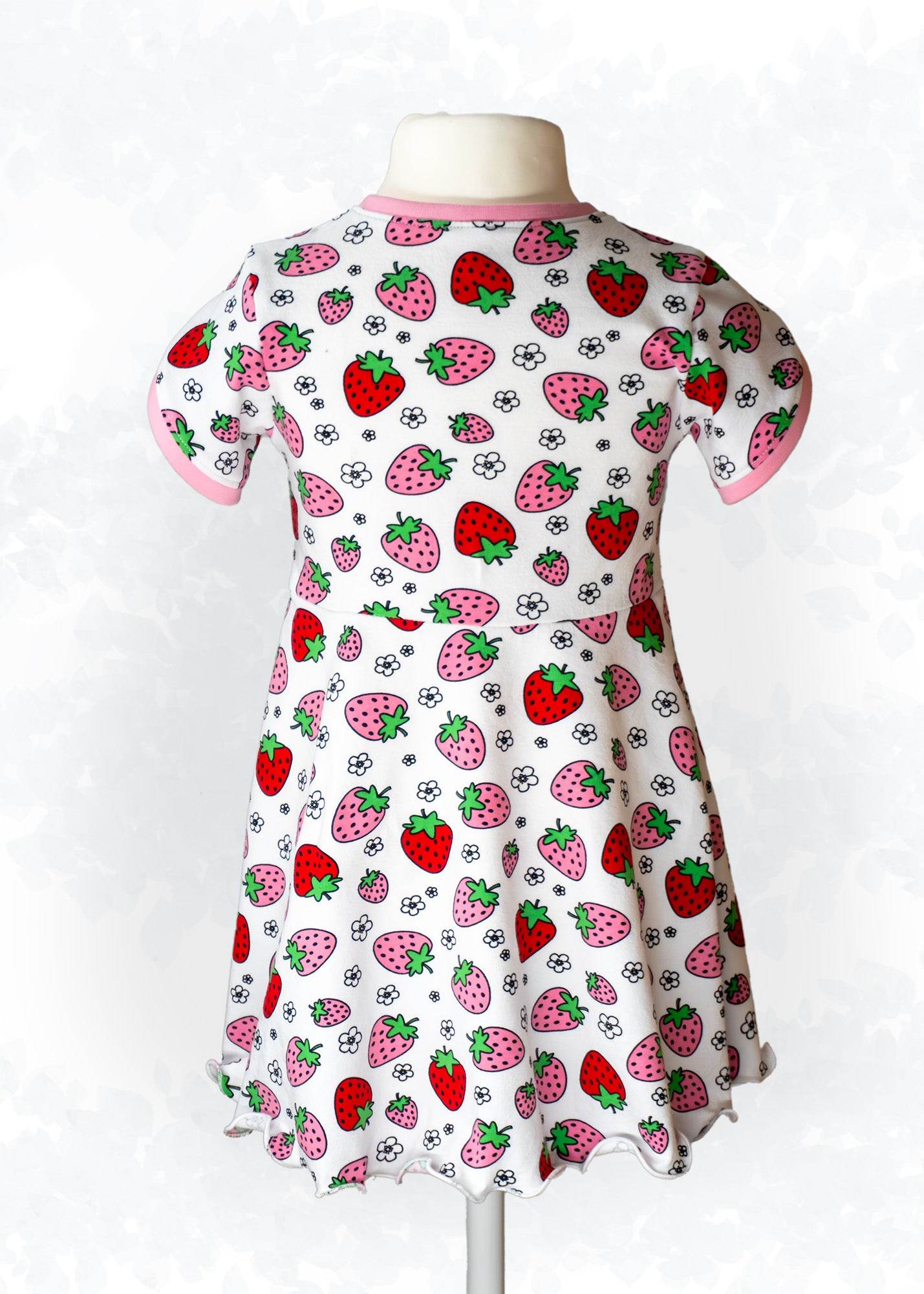 Schnittmuster Becca – Kinderkleid oder Shirt mit Wickeloptik aus Jersey Gr. 86-158 - Sewando