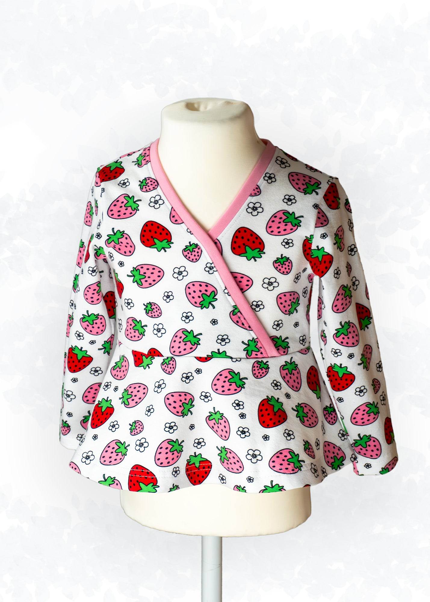 Schnittmuster Becca – Kinderkleid oder Shirt mit Wickeloptik aus Jersey Gr. 86-158 - Sewando