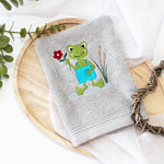 Stickdatei lustiger Frosch mit Blume - Sewando