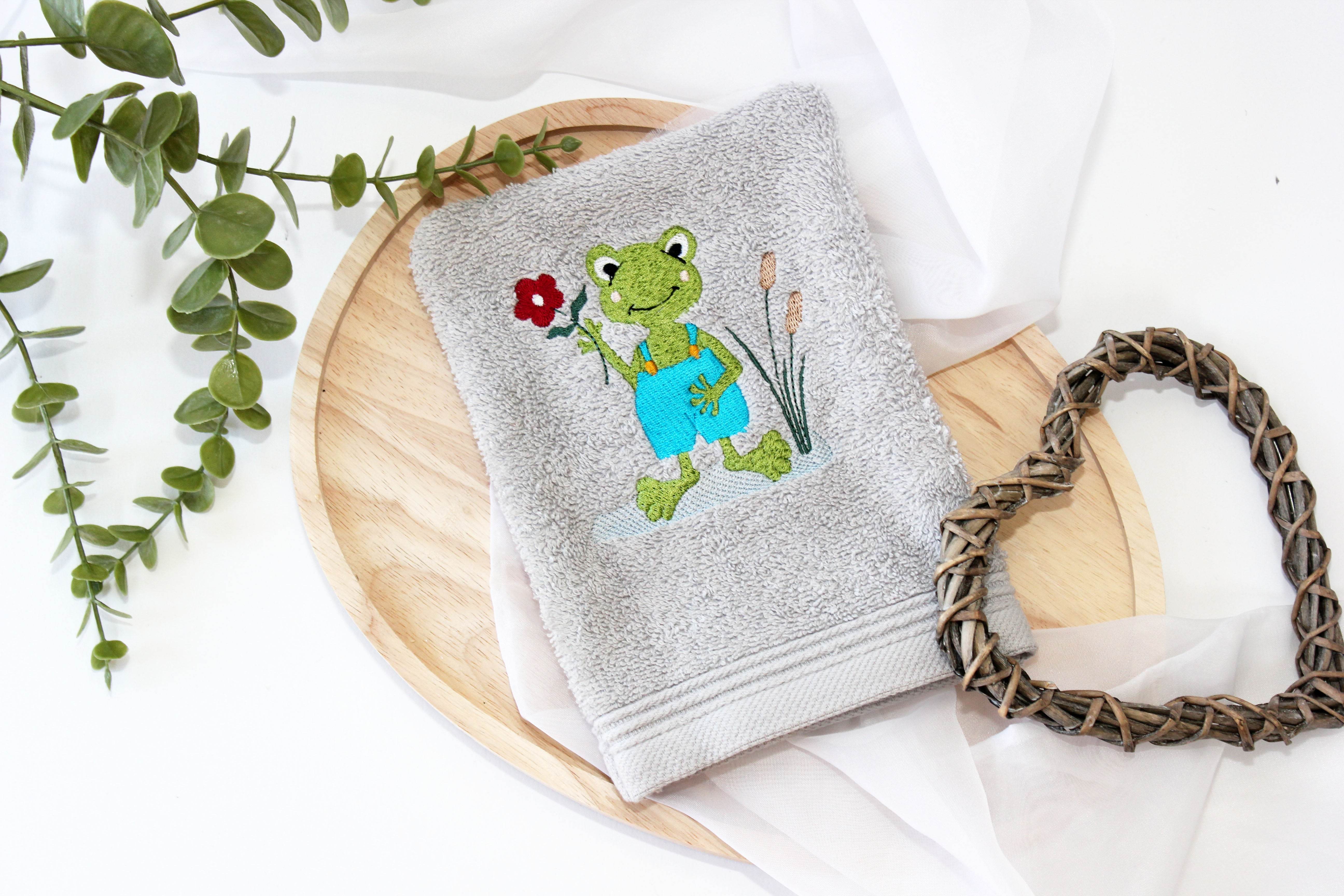 Stickdatei lustiger Frosch mit Blume - Sewando