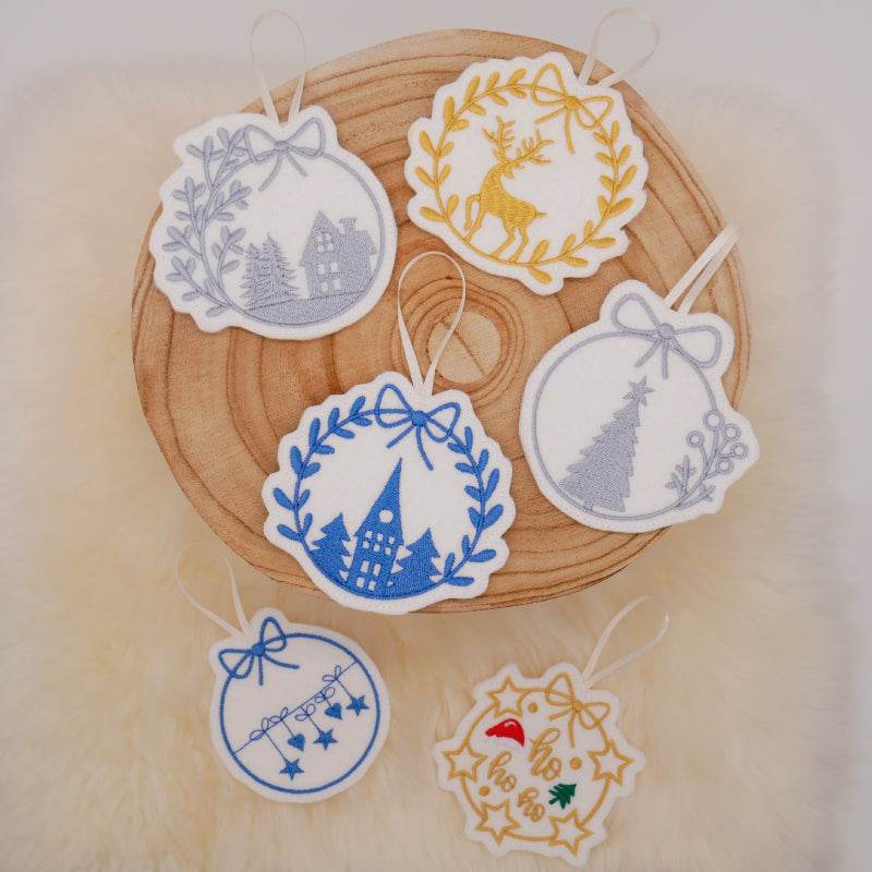 Stickdatei Set weihnachtliche Sillhouetten Scherenschnitt mit Schriftzügen + ITH Anhänger - Sewando