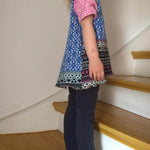 Schnittmuster timtom No.33 Shirt mit Vokuhila-Saum und optionalen Strick- oder Häkeldetails Gr.86-128 - Sewando