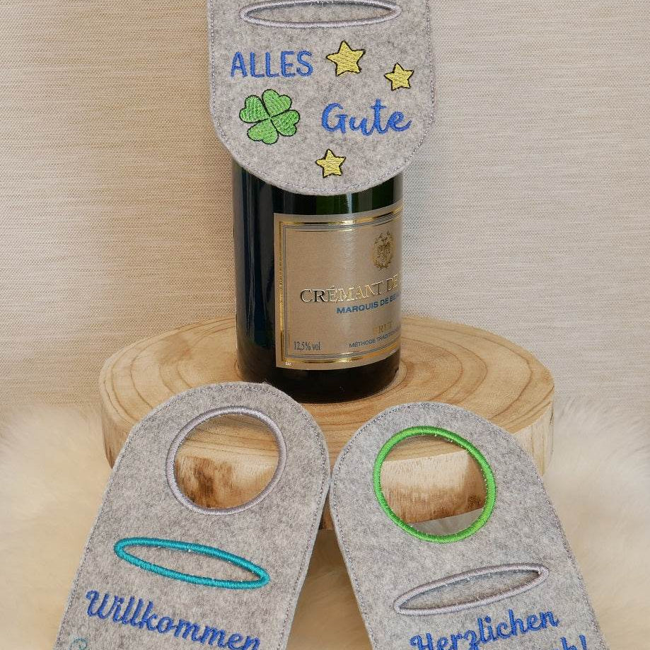 Stickdatei Set Flaschenanhänger Flaschenschürzen Wunscherfüller für Geldgeschenke & Gutscheinhüllen - Sewando