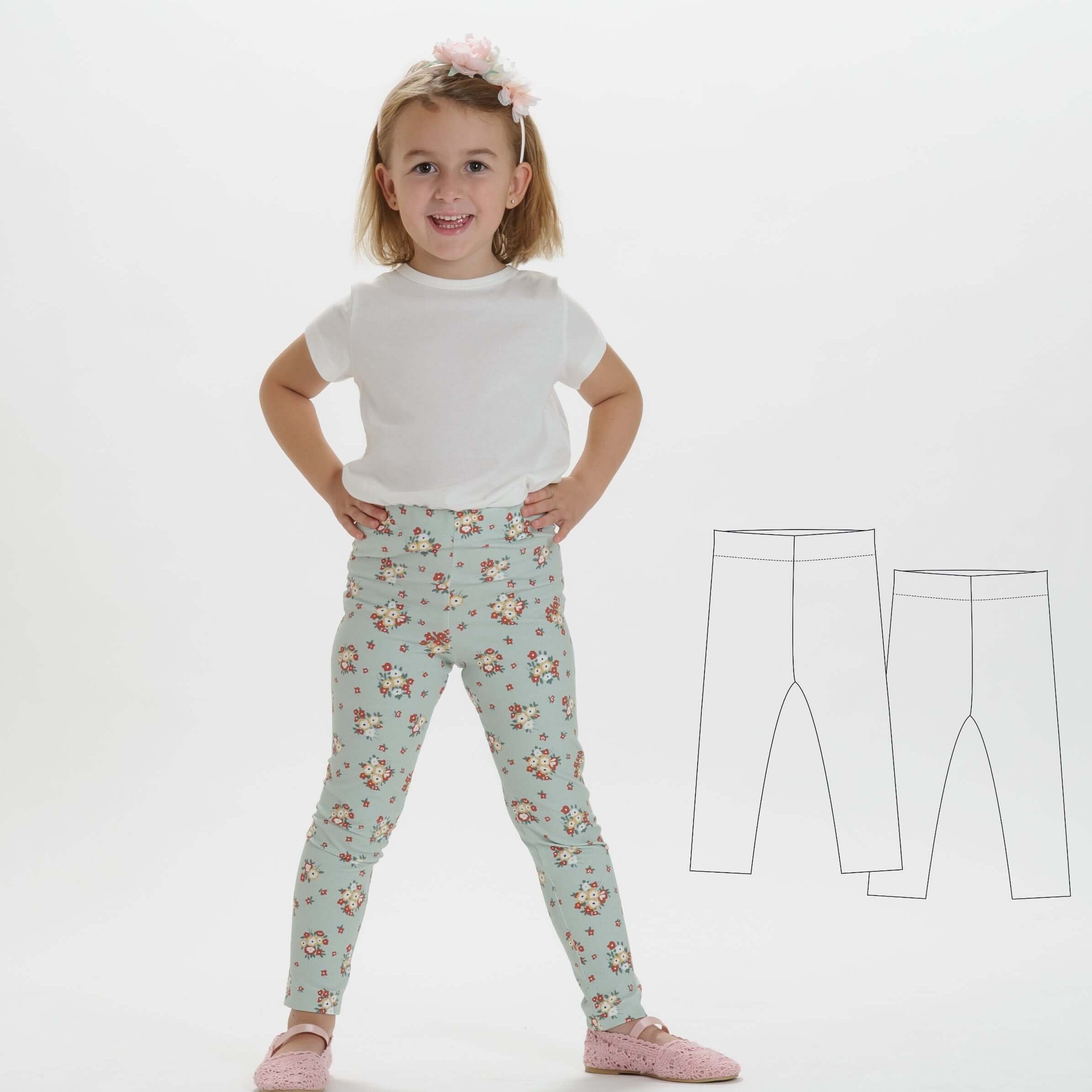 Schnittmuster Baby Kinder Leggings, ein Mädchen trägt farbenfrohe Leggings mit Blumenmuster und weißem Shirt.
