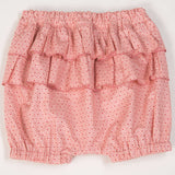 Schnittmuster Baby Twinset Babykleid Hängerchen und Pumphose CLARA EMI – niedliche Rüschenshorts in zartem Rosa.