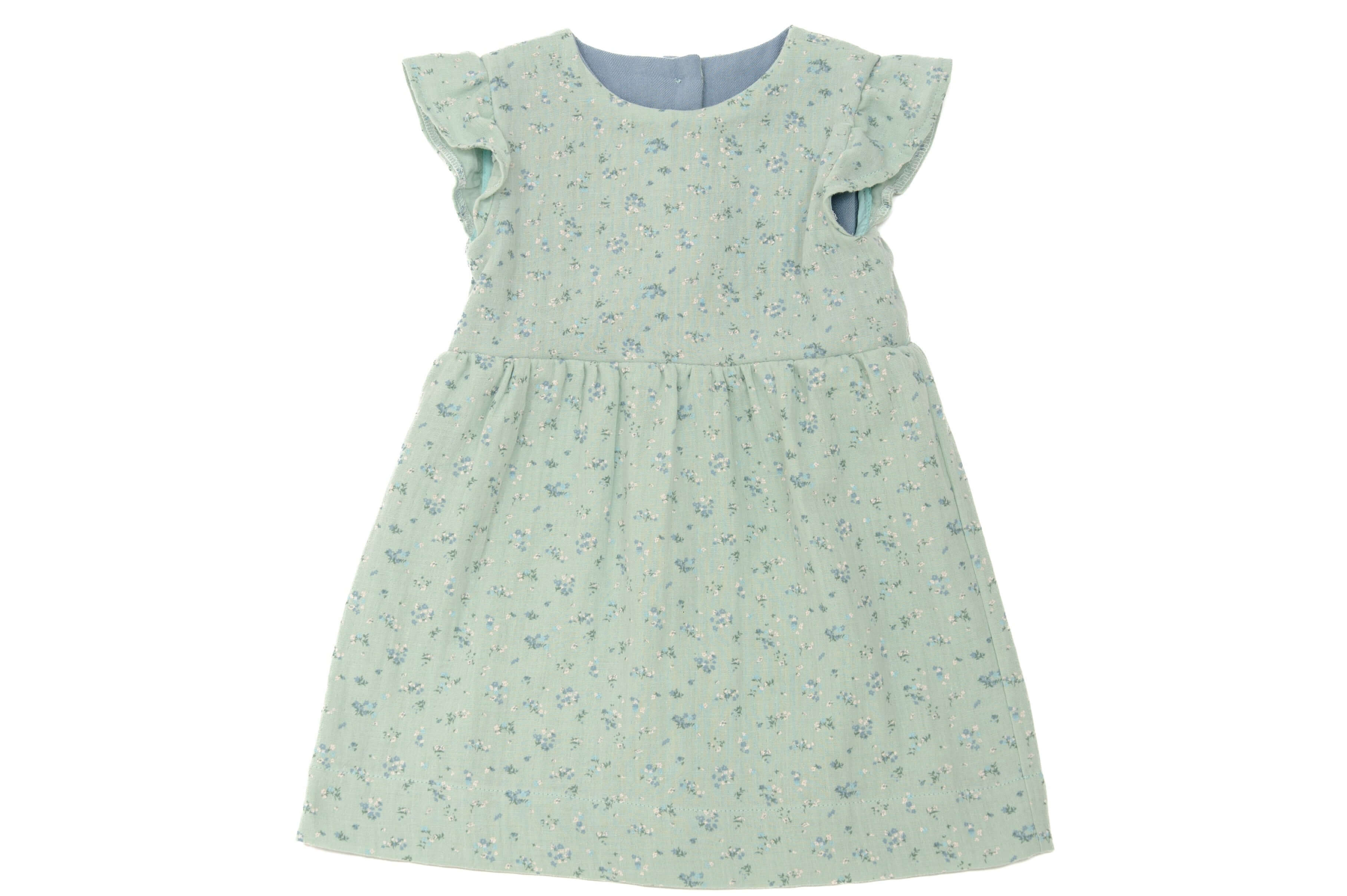 Schnittmuster Retro Kleid für Mädchen ELLA mit langen Ärmeln in hellgrünem Blumendesign.