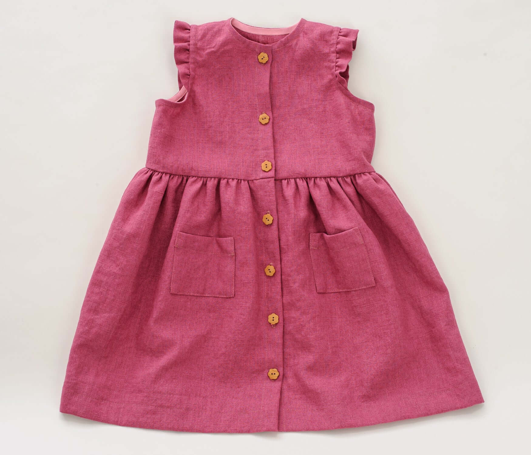 Schnittmuster Kleid MIMI, verspieltes Mädchenkleid in Rosa mit Knöpfen und Taschen, PDF-Schnittmuster 2-in-1.