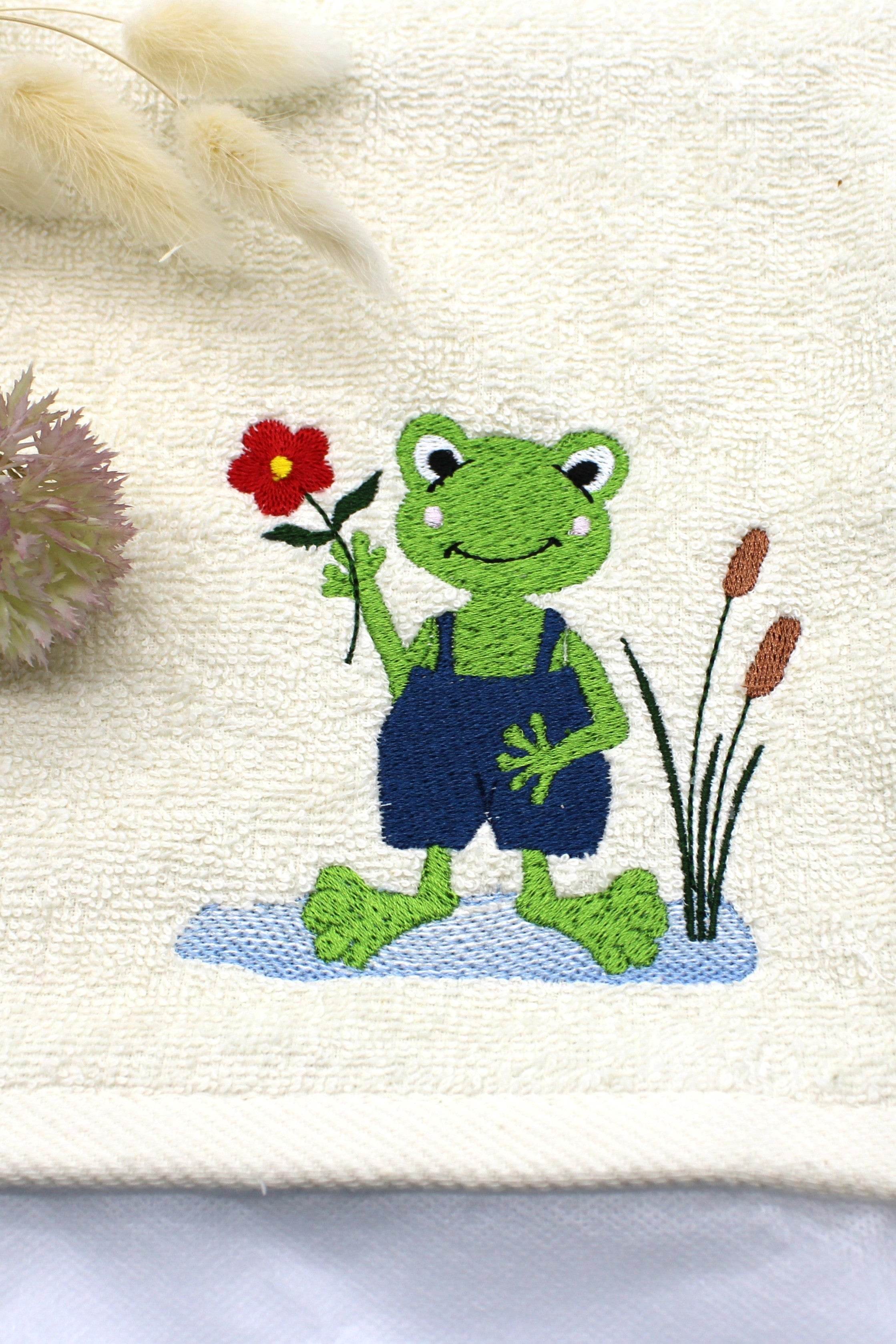 Stickdatei lustiger Frosch mit Blume - Sewando